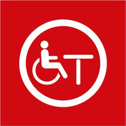 Vergrößerte Ansicht von Hier ist ein Symbol, das für die Möblierung/Bestuhlung für gehbehinderte oder auf den Rollstuhl angewiesene Menschen steht. Der Hintergrund ist ein rotes Quadrat. Das Bild stellt symbolisch dar:  -	Eine Person, die im Rollstuhl vor einem unterfahrbaren Tisch sitzt 