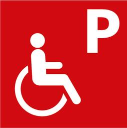Vergrößerte Ansicht von Hier ist ein Symbol, das einen rollstuhlgerechten Parkplatz anzeigt. Der Hintergrund ist ein rotes Quadrat, im Vordergrund ist eine Person, die im Rollstuhl sitzt und oben rechts ist ein großes P. 