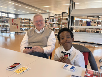 Vergrößerte Ansicht von Tandem Mentor mit Kind