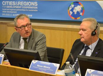 OB Dr. Peter Kurz zusammen mit dem EU-Kommissar für internationale Zusammenarbeit und Entwicklung, Neven Mimica