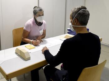 Aufklärungsgespräch im Impfzentrum Mannheim