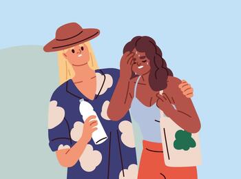 Ein Mann stützt eine Frau, der die Hitze zu schaffen macht.