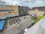Blick vom Dach des Parkhauses auf den Dalbergplatz und die darum liegenden Gebäude